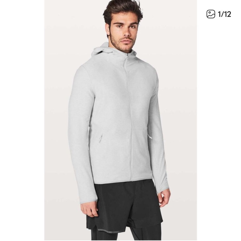 Lululemon Surge Warm Full Zip in the color Heathered Sea Salt